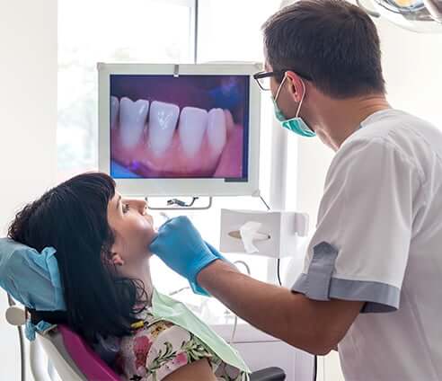 dentist working on a female patient
