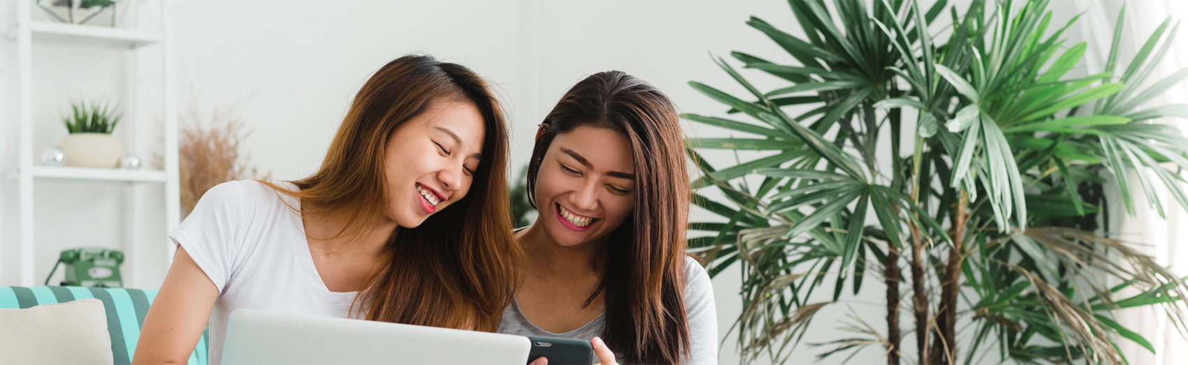 Two women smiling together