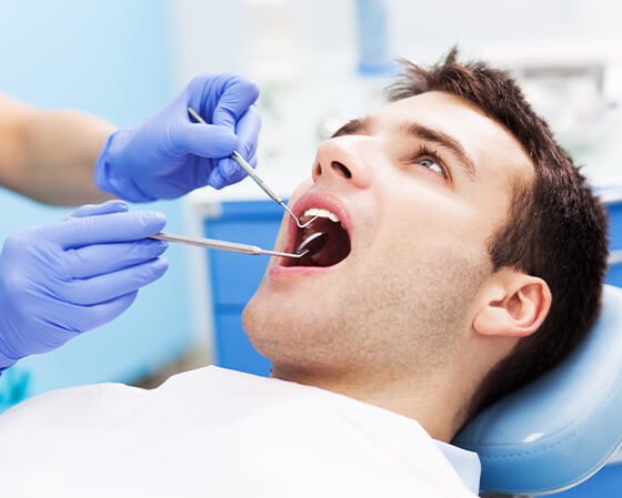 man at the dentist