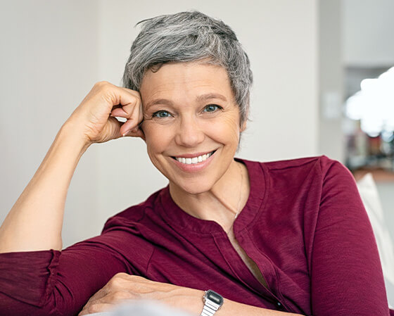 woman smiling with long lasting implants