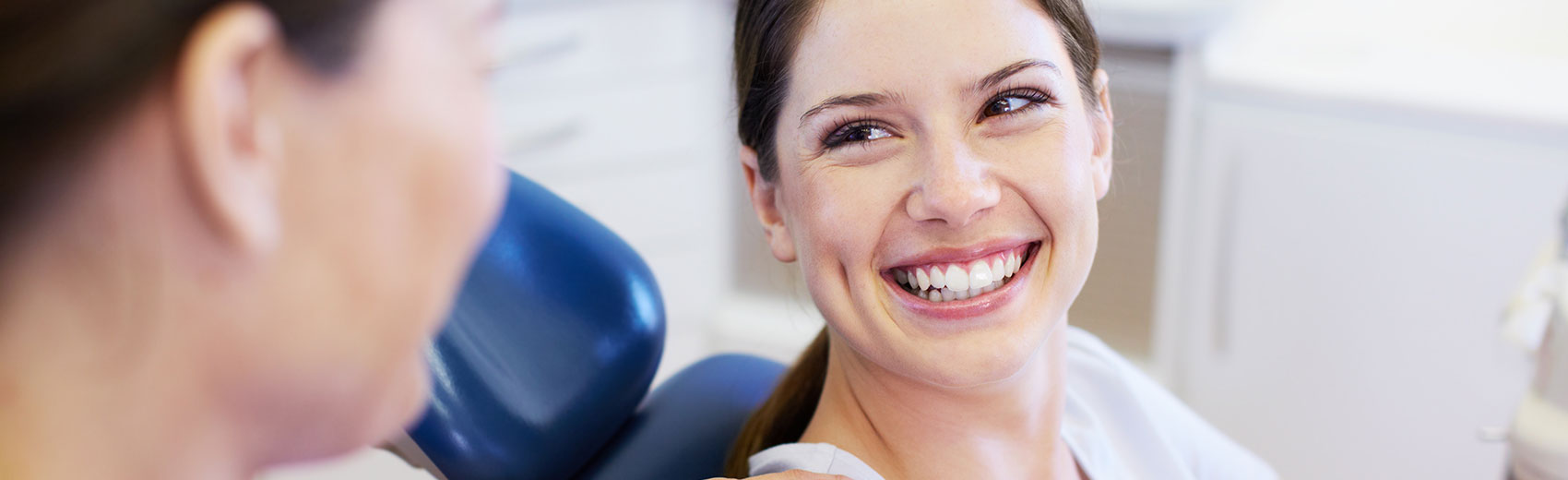 woman smiling at her dentist