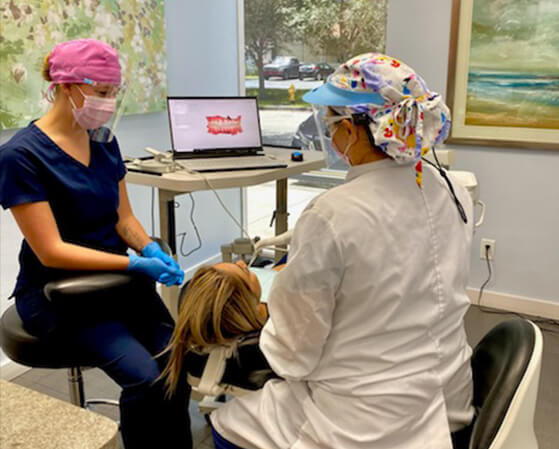 dentist with patient
