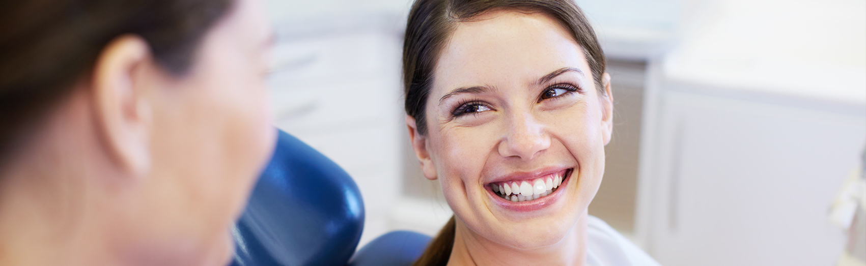 woman smiling at dentist